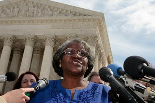 Betty Dukes talks to the press on the steps of the U.S. Supreme Court after the class action lawsuit Dukes v. Wal-Mart was argued before the court in Washington, March 29, 2011.