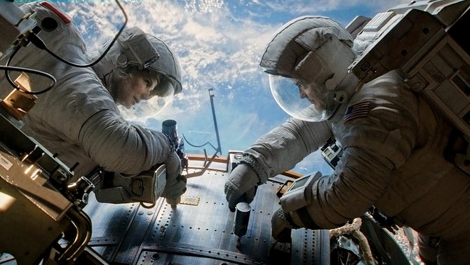 Sandra Bullock and George Clooney shine in the outer-space thrill ride “Gravity.”