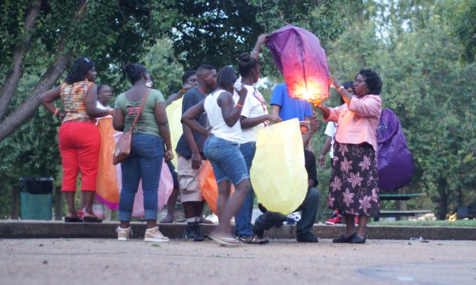 Friends and relatives of Quardious Thomas, a 20-year-old man killed this summer in Jackson, released sky lanterns in his memory.