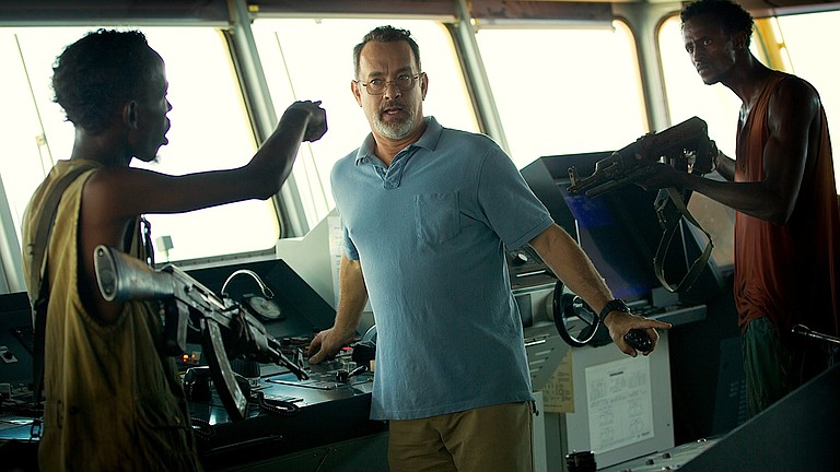 Tom Hanks, center, stars in the new Paul Greengrass movie, “Captain Phillips,” about a vessel overtaken by Somalian pirates.