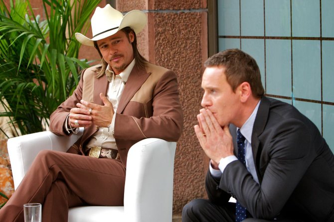 Brad Pitt and Michael Fassbender are among the beautiful faces in the disappointing “The Counselor.”