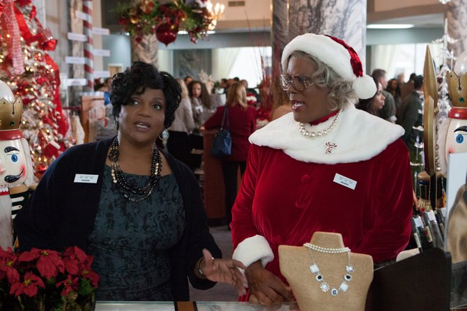 Tyler Perry (right, with Anna Maria Horsford) reprises his cross-dressing role of Madea for a silly seasonal romp in “Tyler Perry’s A Madea Christmas.”