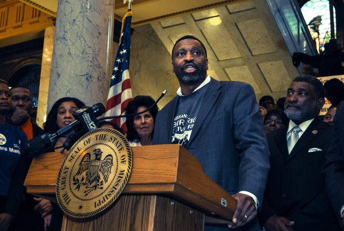 Derrick Johnson (center), president of the Mississippi State Branch NAACP, agreed that MAEP funding and teacher pay are about justice and said the two issues align with his organization's mission of ensuring that all children receive a quality education.