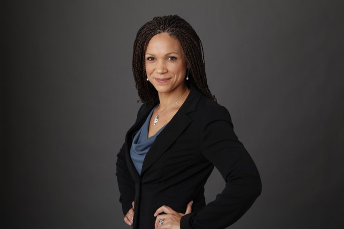 Melissa Harris-Perry apologized after Mitt Romney's family Christmas card, which showed the Republican's adopted, African-American grandson, was joked about on her show. She said she meant to praise the family's inclusion, but the message went awry with her panelists' sarcasm.