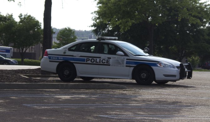 An idling Ridgeland police officer sits on lookout.