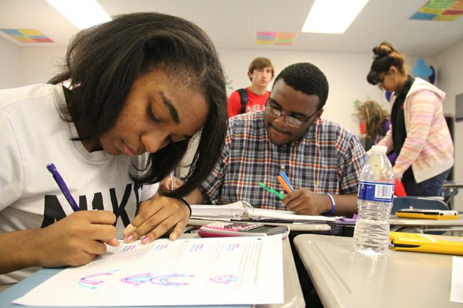 Students in Molly Berry’s algebra class in Tate County work on an assignment together. When the state took control of the district in 2009, the pass rate on the high school algebra exit exam was only 45 percent.