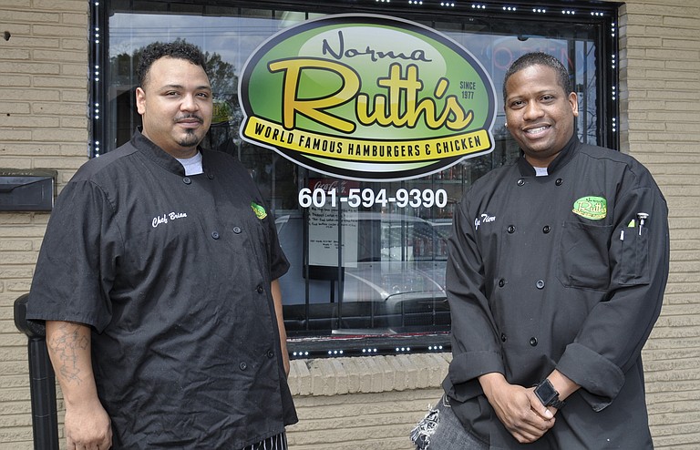 Norma Ruth's chef Brian Myrick (left) and owner John "Stax" Tierre (right) offer up rib-eye steaks, wings, burgers, seafood such as shrimp and crab claws, and more.