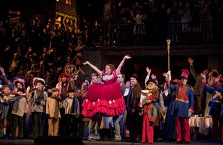 "La Boheme" features 80 chorus members, seven of whom are the principal singers, 100 extras and 35 children. Anita Hartig and Vittorio Grigolo star as Mimi and Rodolfo.