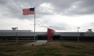Nissan Motor Co. says it has settled an unfair labor practice charge with a pro-union worker at its assembly plant in Canton, Miss.