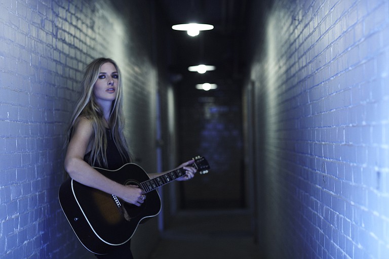 Holly Williams is making a name for herself apart from her famous father, Hank Williams Jr.