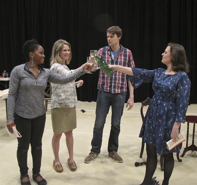 In New Stage Theatre’s production of Beth Henley’s “The Miss Firecracker Contest,” the characters (from left) Popeye (Deja Abdul-Haqq), Carnelle (Jessica Wilkinson), Delmount (David Lind) and Elain (Ali Dinkins) toast Carnelle’s acceptance into the “Miss Firecracker” beauty pageant.