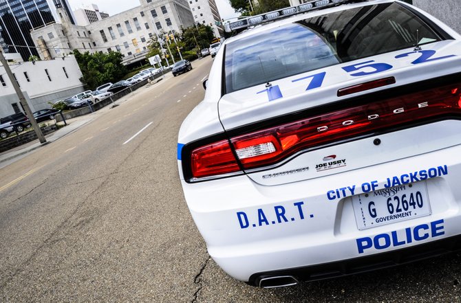 A DART patrol car parked on West Street in downtown Jackson.