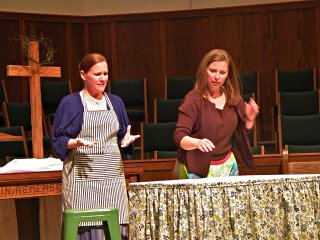 Holly Wiggs and Malaika Quarterman play sisters Martha and Mary in Fish Tale Group Theatre’s “Martha.”