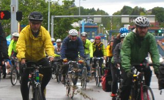 Bike-to-Work Day in Seattle. Washington is spending the most in the nation on projects that incorporate a bike- or pedestrian-friendly element, according to an assessment of state highway spending.