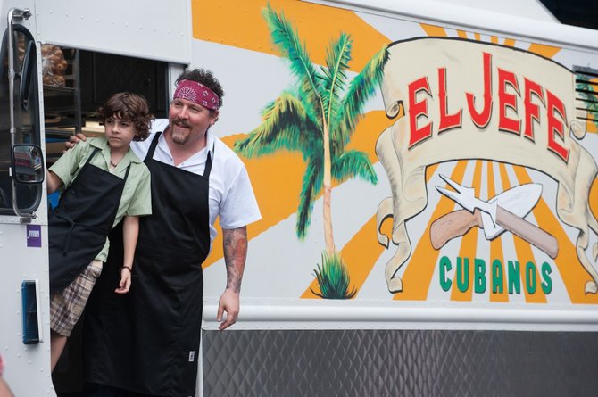 The restoration of an old food truck in “Chef” helps rekindle a broken relationship between a father and his son, portrayed by Jon Favreau and Emjay Anthony.