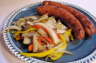 Cooking sausage in liquid that’s part beer deepens the flavors and makes for a perfect food-drink pairing.