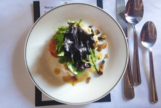 Brandon Smith’s first “Underground Supper Club” featured many delectable dishes, including a salad with dehydrated farmer’s cheese, mandarin slices, pickled shallots and a pecan pig-jowl granola, topped with a thyme sorghum vinaigrette.