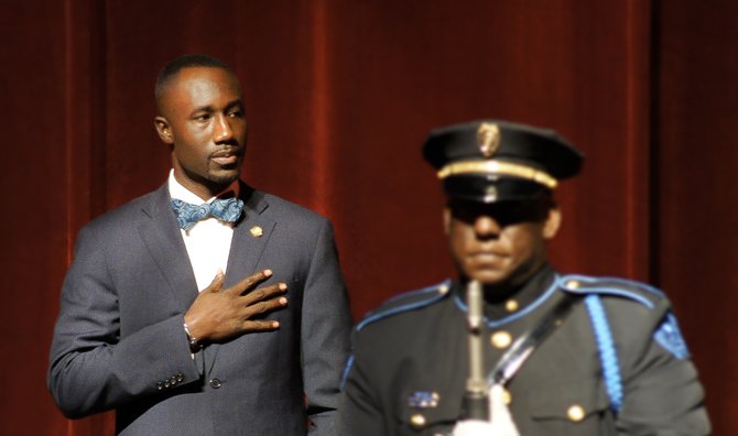 Mayor Tony Yarber and a member of the JPD Color Guard during the Pledge of Allegiance