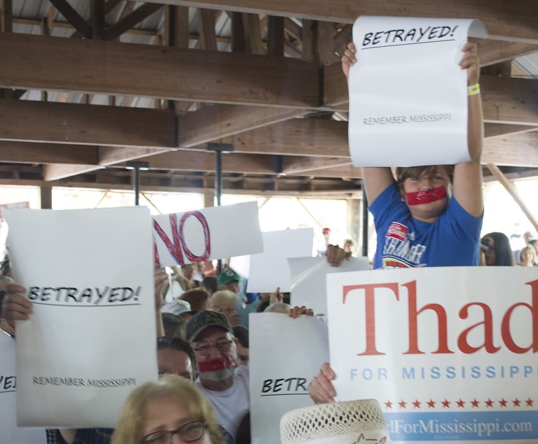 Sen. Chris McDaniel’s supporters brought signs to the Neshoba County Fair’s 2014 political speeches that read “betrayed” and “RINO” (or Republican In Name Only) targeted at U.S. Sen. Thad Cochran.