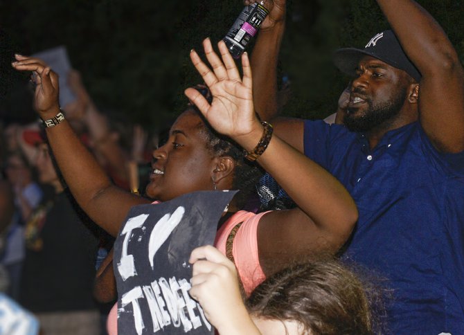 Brittany Gray and Tyson Jackson, Jackson-area community activists, joined attorney C.J. Lawrence (not pictured) on a trip to Ferguson, Mo., over the weekend. They participated in a number of demonstrations in the case of unarmed black teenager Mike Brown, whom Ferguson police officer Darren Wilson shot and killed on Aug. 9.