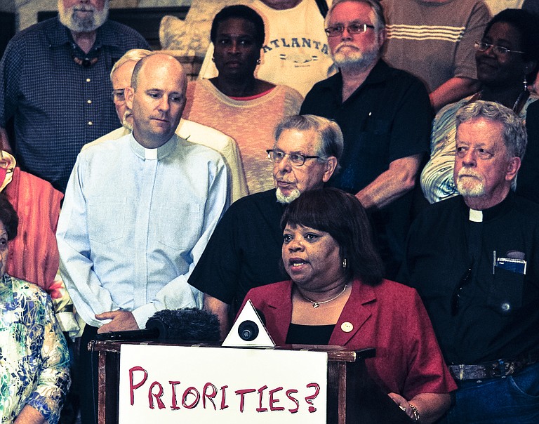 Brenda Scott, president of the Mississippi Alliance of State Employees, a labor organization, questioned whether state politicians are really doing God's work in Mississippi.