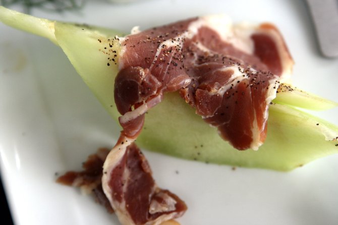 Melon and prosciutto combine for a satisfying, easy snack.