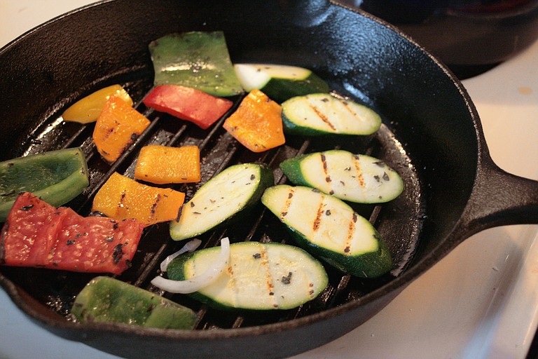 Cast-iron pans are handy for grilling indoors when it gets cooler outside.