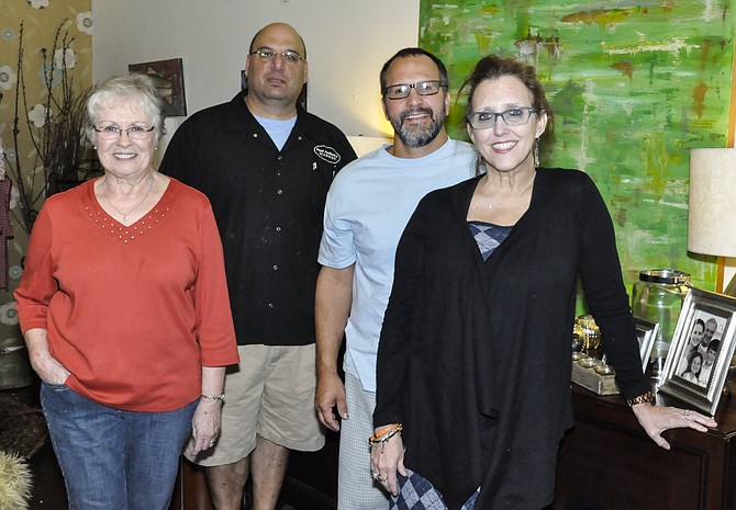 (From right to left) Ann Turner Williams and husband Mike Williams, owners of Drake’s Designs Florist & Gifts, Paul Korey, owner of Paul Anthony’s Market, and Cheryl Blacklidge, store manager of The Book Rack, are celebrating small businesses with Books & Boos, Wednesday, Oct. 29.