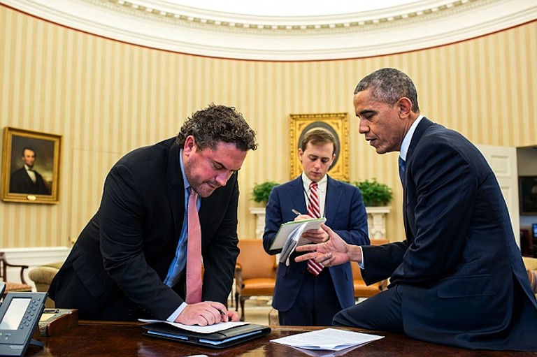 President Obama (right) working on his immigration speech with Director of Speechwriting Cody Keenan (left) and Senior Presidential Speechwriter David Litt (center) in the Oval Office.