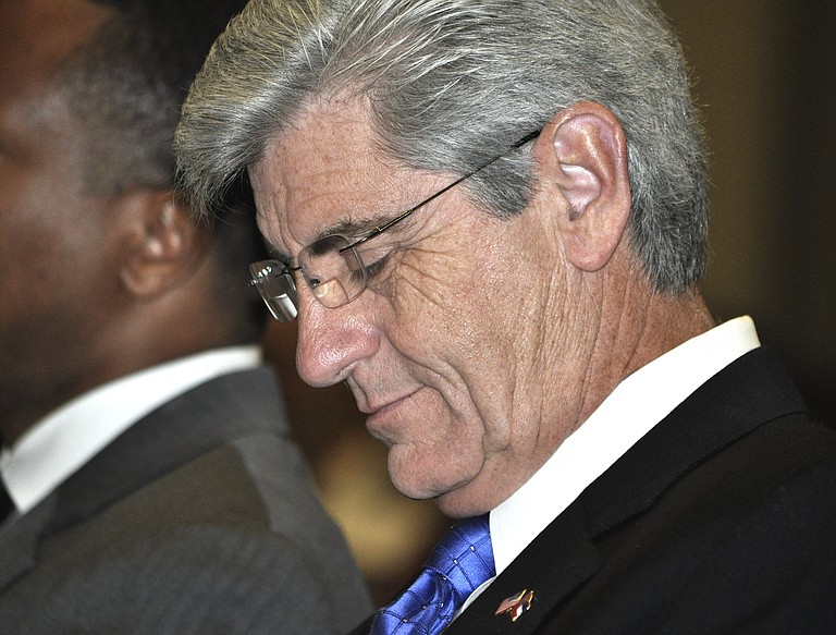 Democrats say Gov. Phil Bryant’s proposed budget is all smoke and mirrors.