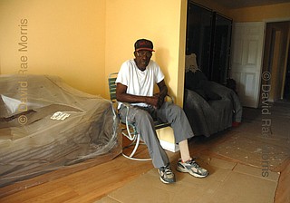 Herbert Gettridge, then 83, sits in the front room of his house on North Roman Street in the Lower 9th Ward of New Orleans, Louisiana June 1, 2007, the first day of the Atlantic hurricane season. Gettridge evacuated New Orleans prior to Hurricane Katrina, but his house, which he built himself in the early 1950s, took on more than 10 feet of water. Photo courtesy David Rae Morris