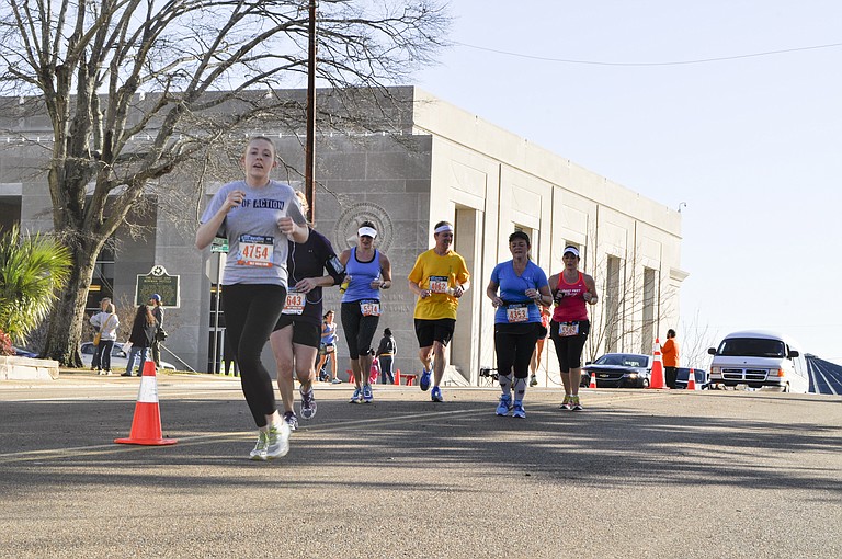 Runners participate in the 2014 Mississippi Blues Marathon.