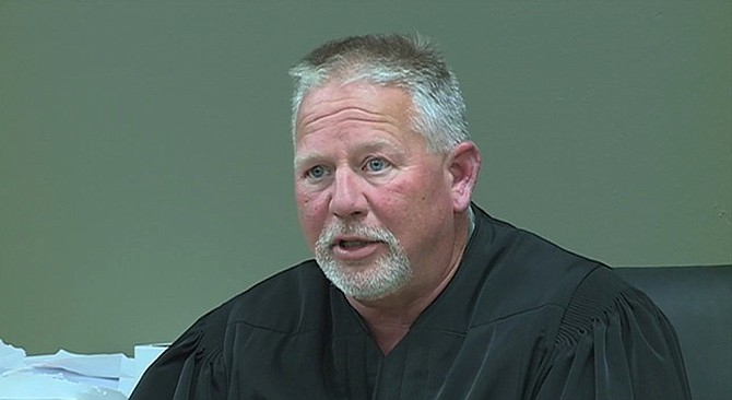 Madison County Justice Court Judge Bill Weisenberger is being accused of knocking down, slapping and kicking a mentally disabled young black man and yelling a racial slur: "Run, n*gger, run." Photo courtesy WAPT News Channel 16