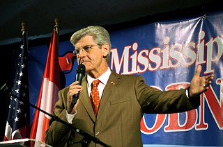 First-term Gov. Phil Bryant picked up a Republican primary challenger Thursday, the day before candidates' deadline to qualify for statewide, regional and legislative races.