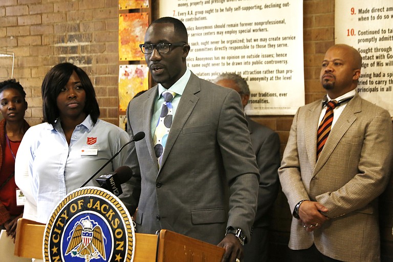 Mayor Tony Yarber (center) this morning credited his wife, Rosalind (left), who works for the Salvation Army, with coming up with the goal of ending homelessness among veterans by the end of the year. Also pictured is Marshand Crisler (right), deputy chief administrative officer for the City of Jackson.