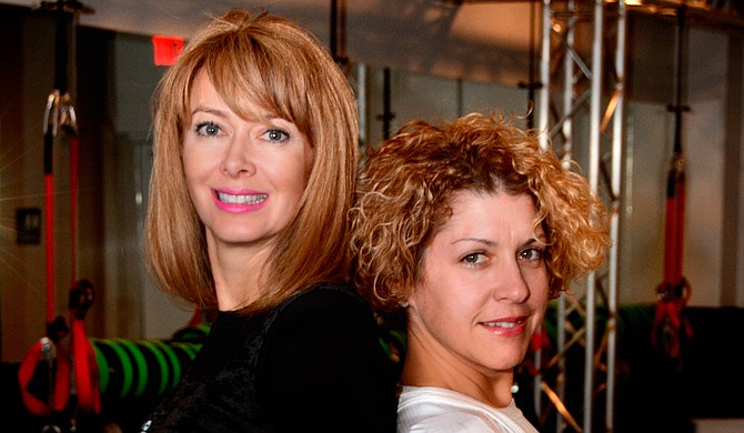 Guruz Fitness Studio, owned by Lacee Chagnon (left), helped Denise Moulier (right) grasp the concept of high-peformance living.