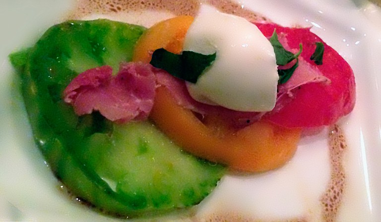 At 1908 Provisions’ March 4 Chef’s Table dinner, Chef Gary Hawkins offered diners seasonal dishes such as 
this one made with heirloom toma-toes, burrata, prosciutto and basil.