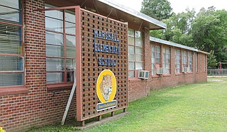 School sign outside Marshall Elementary in Carroll County, Miss., which is desperately in need of funding. Photo courtesy Nick Chiles