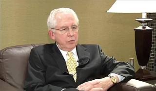 Southeastern Conference Commissioner Mike Slive unexpectedly stepped down Friday, just minutes after announcing record revenue and a groundbreaking rule. Photo courtesy YouTube/Mizzou Football Channel