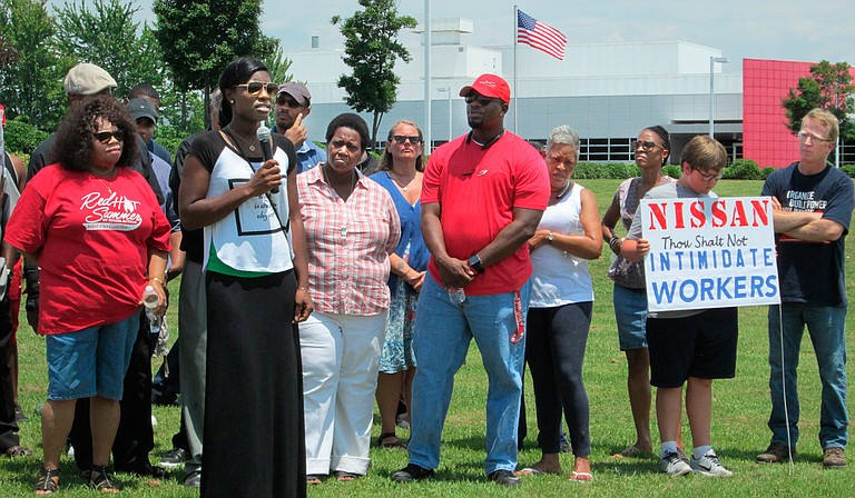 Outside the Nissan plant in Canton, clergy, family, friends and workers protest what they call intimindation by company against pro-union workers. Photo courtesy Zachary Oren Smith