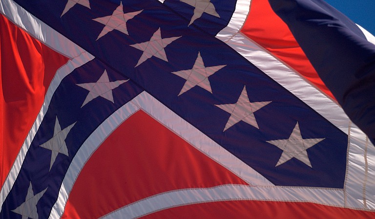 "The battle flag has to be removed from the state flag of Mississippi and from display anywhere other than museums, historical events and cemeteries." Photo courtesy Flickr/Stuart Seeger