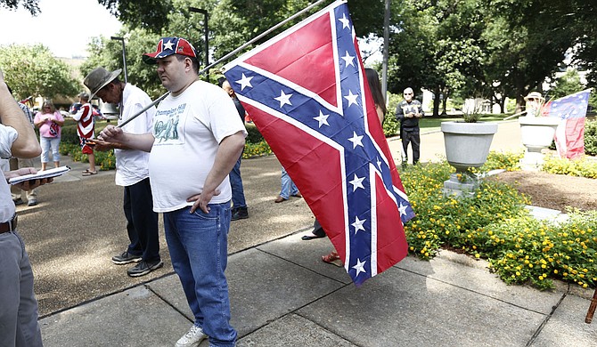 Craig Hayden, who attended a pro-Confederate heritage rally, said the flag represents Southern pride, not hate.