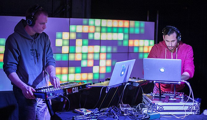 (Left to right) Bruce Bijesse and Robert Gray of Asheville, N.C., who make up electronic duo BomBassic, perform Wednesday, July 8, at Offbeat. Photo courtesy All-Star Creative Media