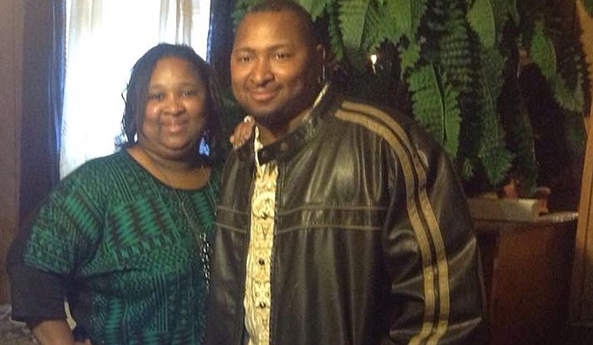 Jonathan Sanders (right) poses with Nicole Holloway (left) in a photo on the Facebook page of Sanders' mother, Frances Sanders. Photo courtesy Facebook/Frances Sanders
