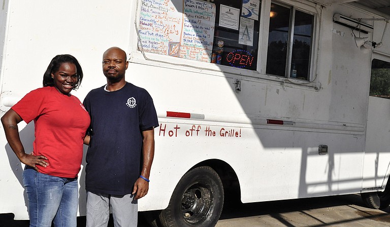 2 for 7 Kitchen owners Deandrea (left) and Omario Moore (right) have partnered with the Mississippi Museum of Art to let artists create a new design for the food truck’s exterior. Trip Burns/File Photo