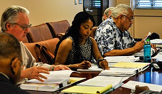 Jennifer Johnson (center), president of the Jackson Redevelopment Authority Board of Commissioners, wants the JRA to consider expanding its mission beyond downtown development to community housing. 