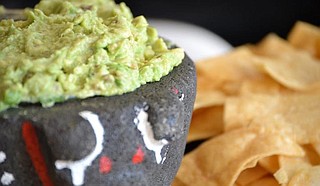 Folks crave Guacamole at Babalu Tacos & Tapas. Photo courtesy Babalu Tacos & Tapas