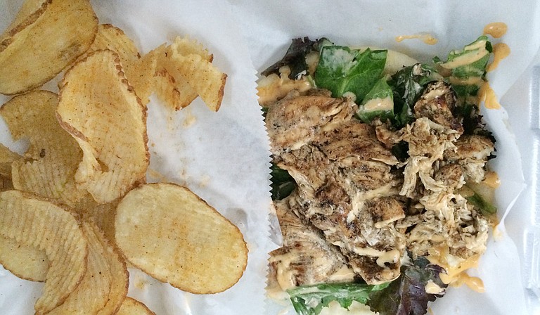 Grilled chicken pita with homemade potato chips Photo courtesy Emerald Alexis Ware