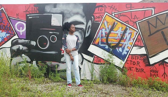 Jackson pop artist Adrienne Domnick (pictured in front of a mural in Bywater, New Orleans) often creates pieces that center on artists and musicians that she finds inspiring. Many of them are African Americans. Photo courtesy Mississippi Museum of Art