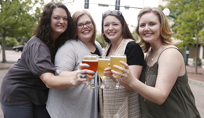 JXN Barley’s Angels, which includes (left to right) Heather Collette, Charlene Williams, Toni Francis, who started the Jackson chapter, and Shanna Head, hopes to educate women on craft beer and create spaces to have a good time while supporting local breweries.